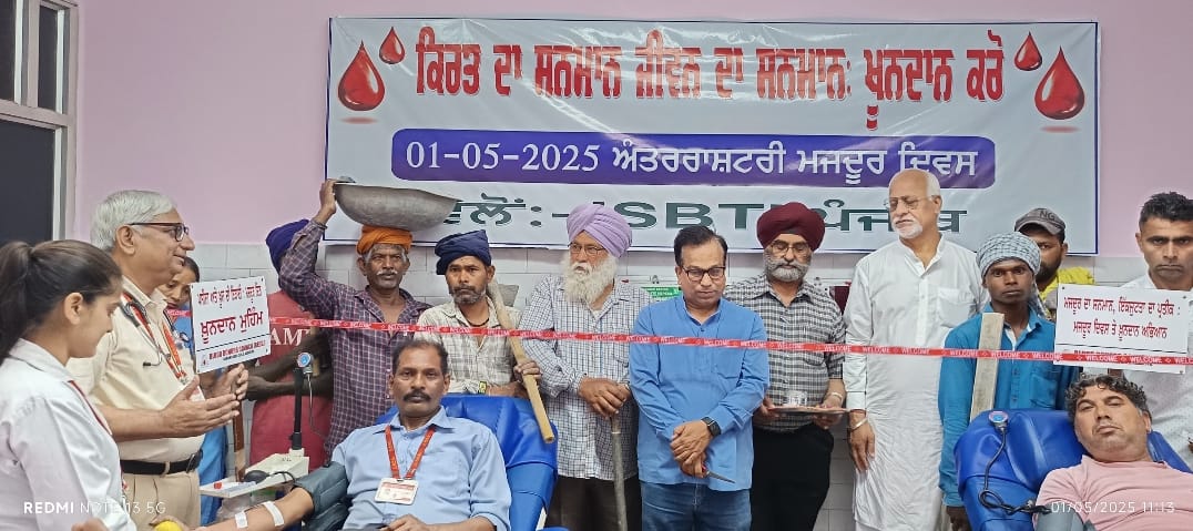 Workers who arrived with tools donated blood in the blood donation camp organized on "World Labor Day".